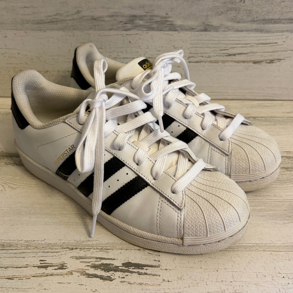 Adidas superstars in white and black